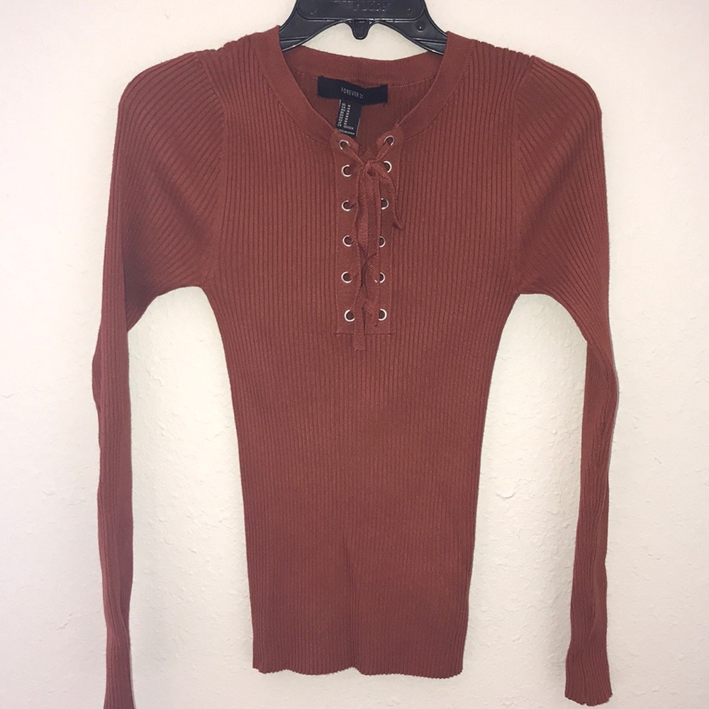 Orange tight fitting shirt